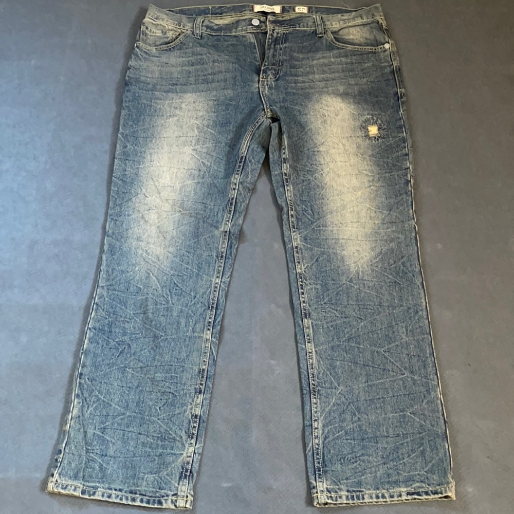 Nice designer blue jeans with a touch of beige added to design. Decibel brand.